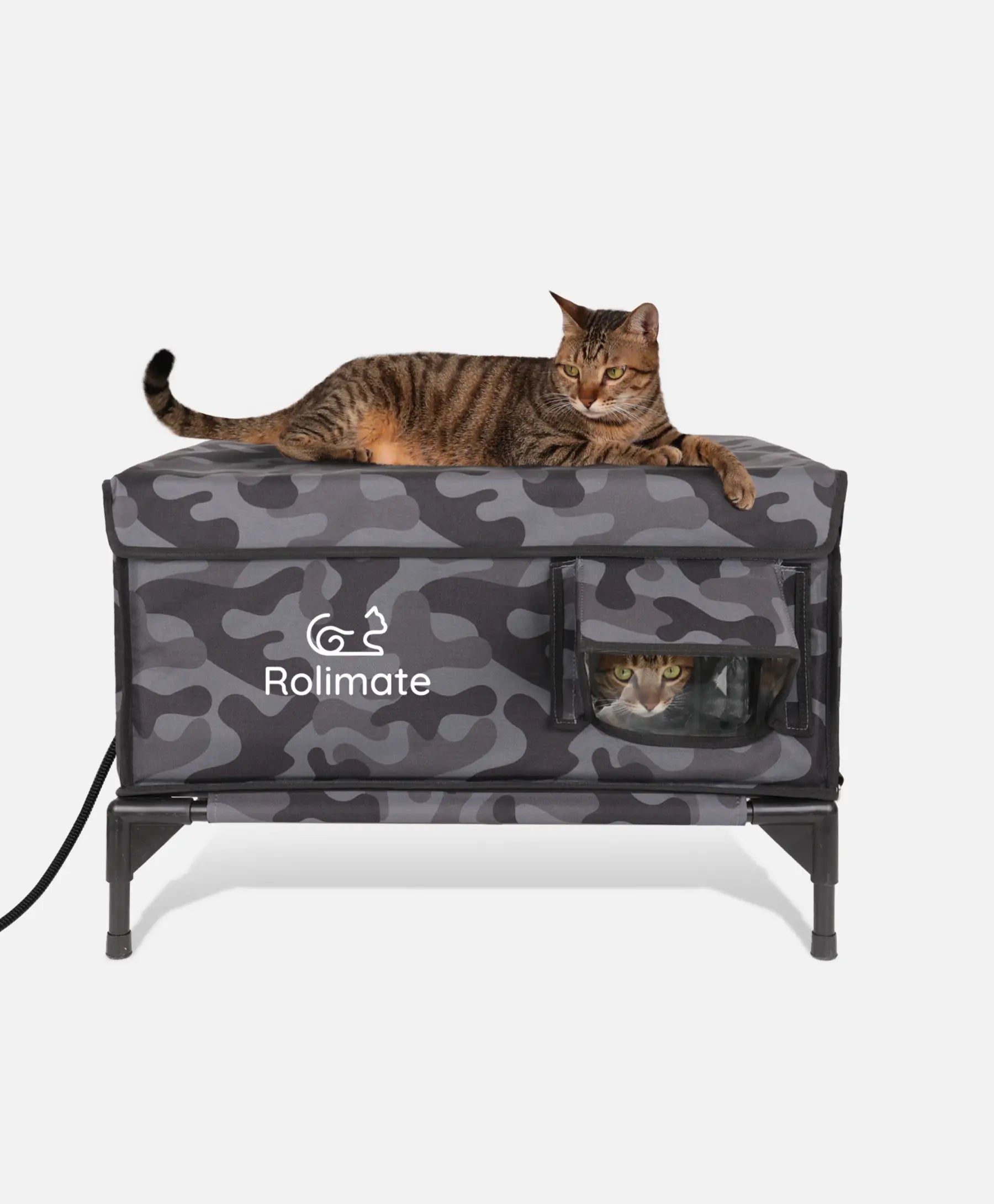 Camouflage heated outdoor cat house by Rolimate, offering comfort and safety for outdoor pets.